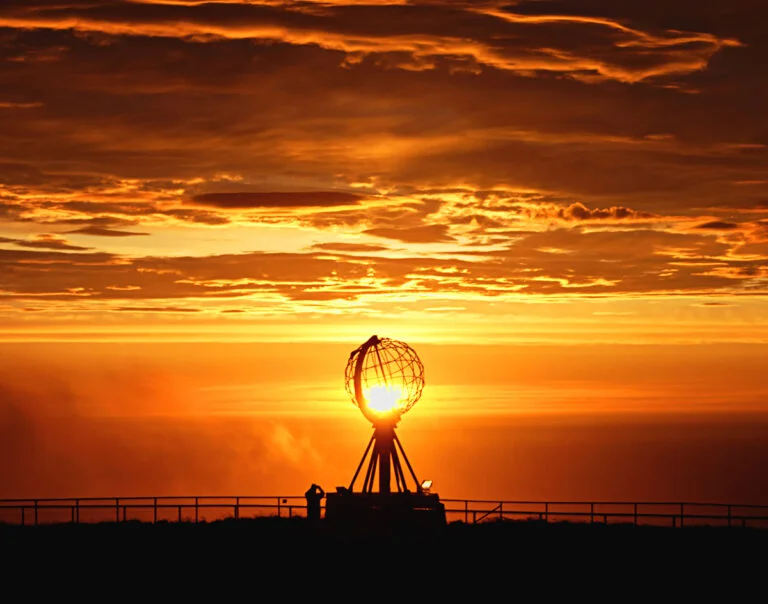 Nordkapp in the orange glow of the midnight sun.