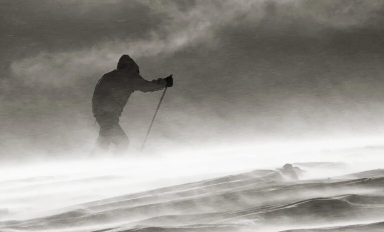 Norway skier in bad weather.