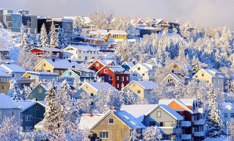 Tromso's house on the hillside in winter.