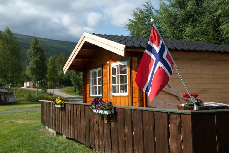 Norwegian flag outside a cabin in Norway.