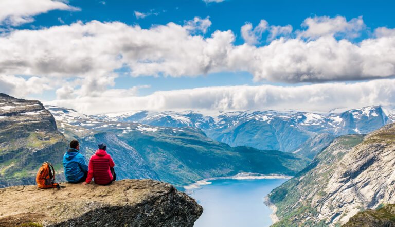 Norwegian people on a mountain hike in Norway.