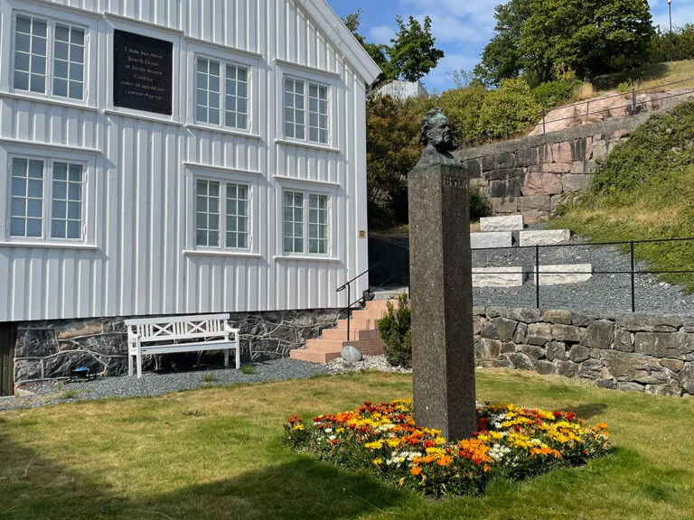 Henrik Ibsen bust outside Ibsen museum in Grimstad