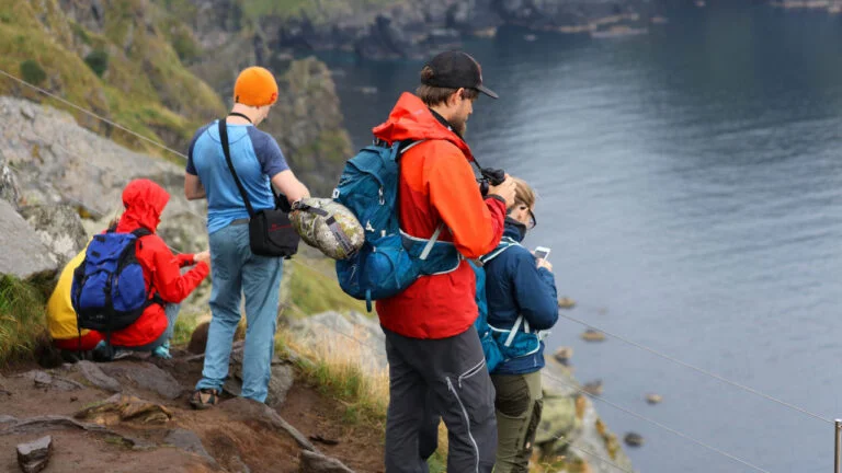 Birdwatchers and photographers on Runde, Norway