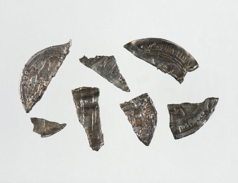 Arabic coins were among the Stjørdal Viking silver find. Photo: Birgit Maixner / NTNU Science Museum.
