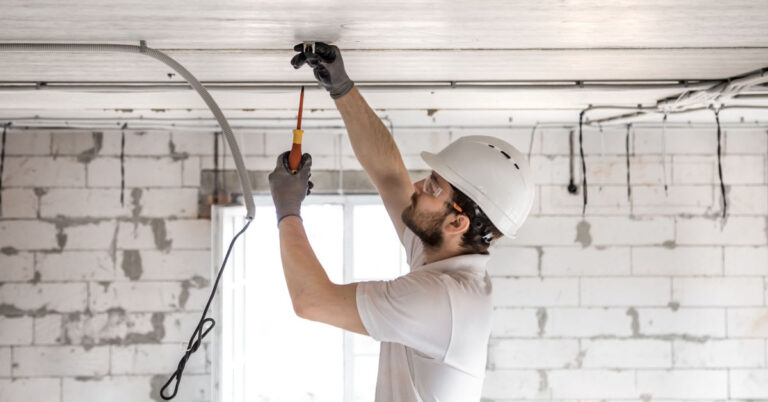 An electrician installer working in Norway.