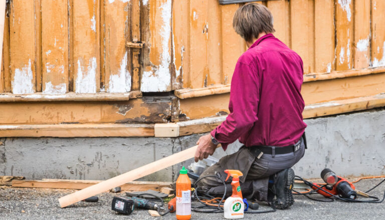 Carpenter working in Trondheim, Norway. Photo: Editorial credit: Ruben M. Ramos / Shutterstock.com.