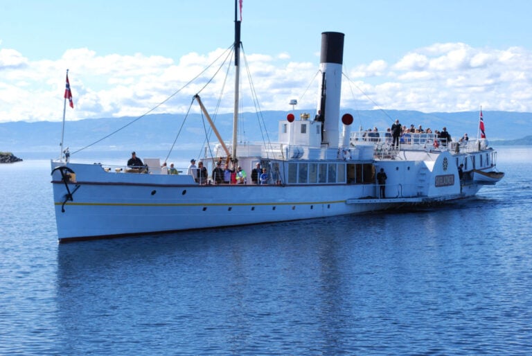 Skibladner steamship carries tourists on Lake Mjøsa in Norway.