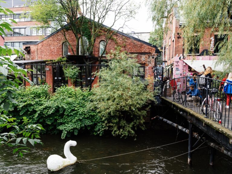 An artsy part of the Akerselva river in Oslo, including the famous ‘swan’ sculpture. Photo: JJFarq / Shutterstock.com.