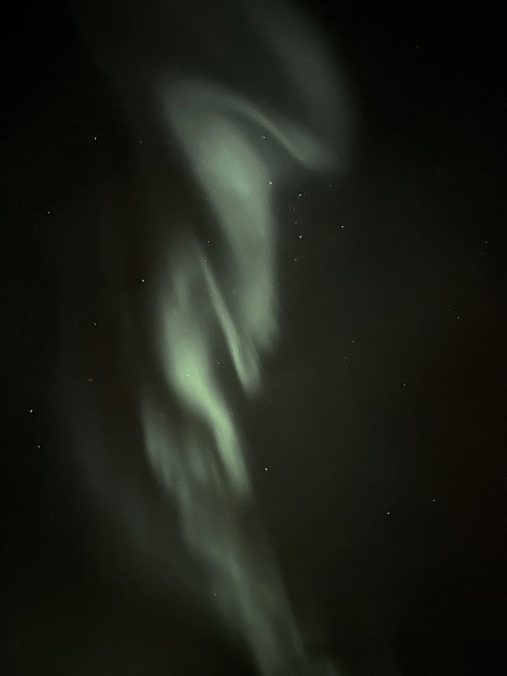 Aurora borealis against the starry sky.