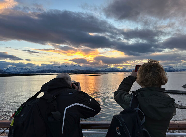 Photographers on the MS Borealis docked in Molde.