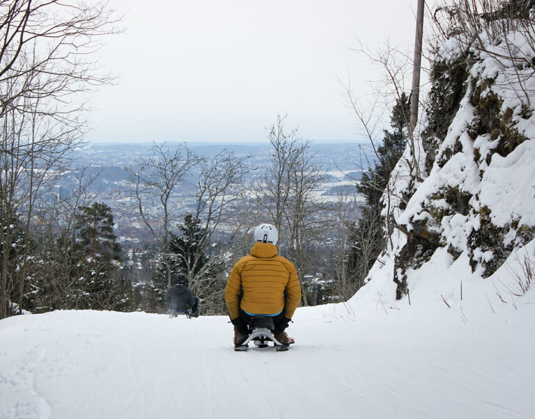 Sledding action in Oslo, Norway.