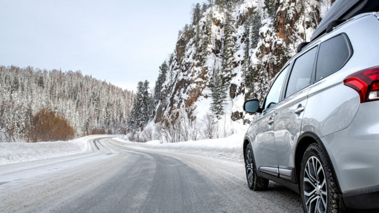 Car driving on winter road.