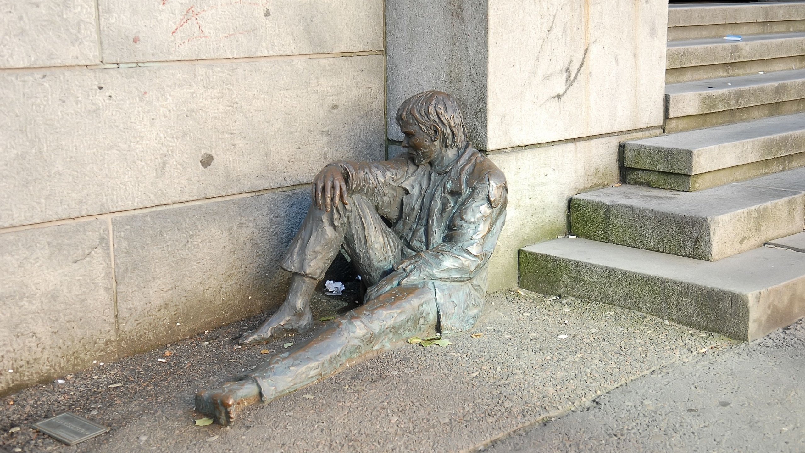 Famous homeless man sculpture in Bergen