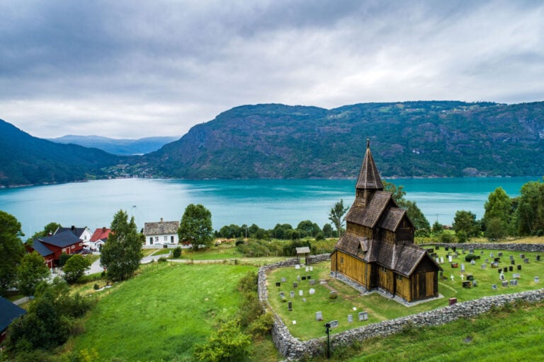 Aerial summer view of Urnes Stave church in Lustrafjorden in Norway.
