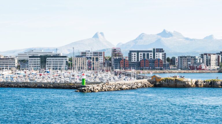 View of the harbour and mountains in Bodø, Norway.