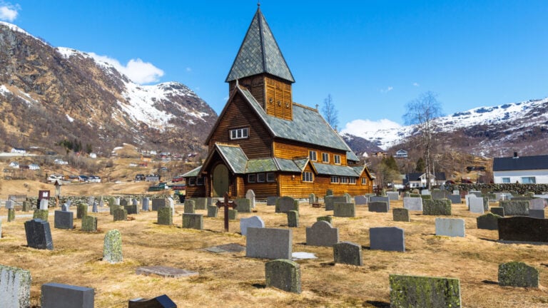 Norway stave church and graveyard image.