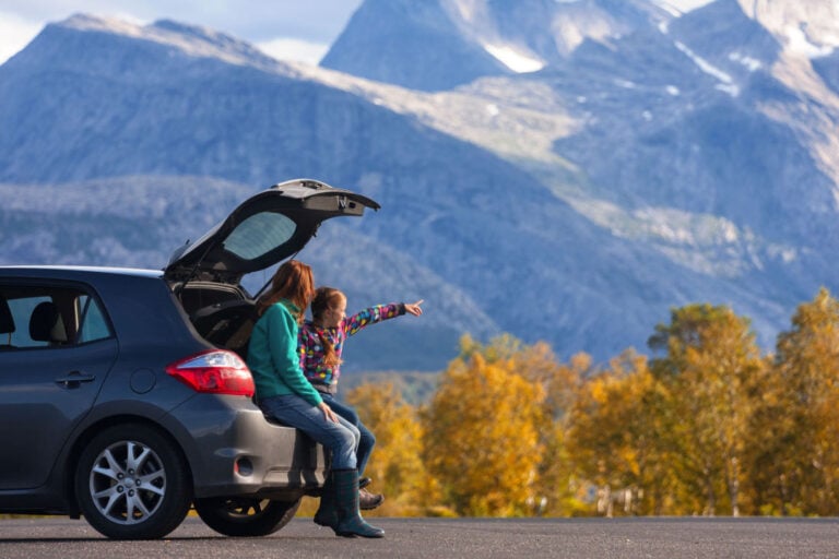 Tourists with car in Norway.