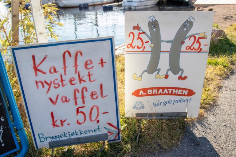 Kiosk sign advertising waffles. Photo: Tamara Lopes / Shutterstock.com.