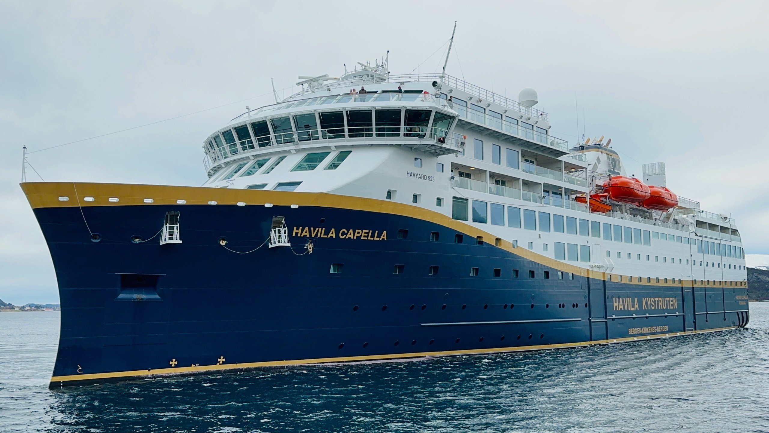 Havila Capella coastal cruise ship docking in Ålesund, Norway.