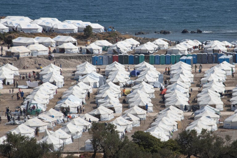 A temporary refugee camp in Lesbos, setup in 2020. Photo: Editorial credit: Nicolas Economou / Shutterstock.com.