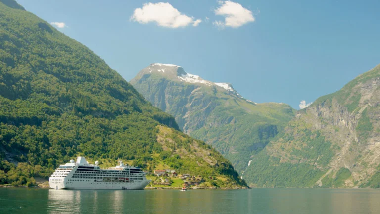 Cruise ship in a Norway fjord image.