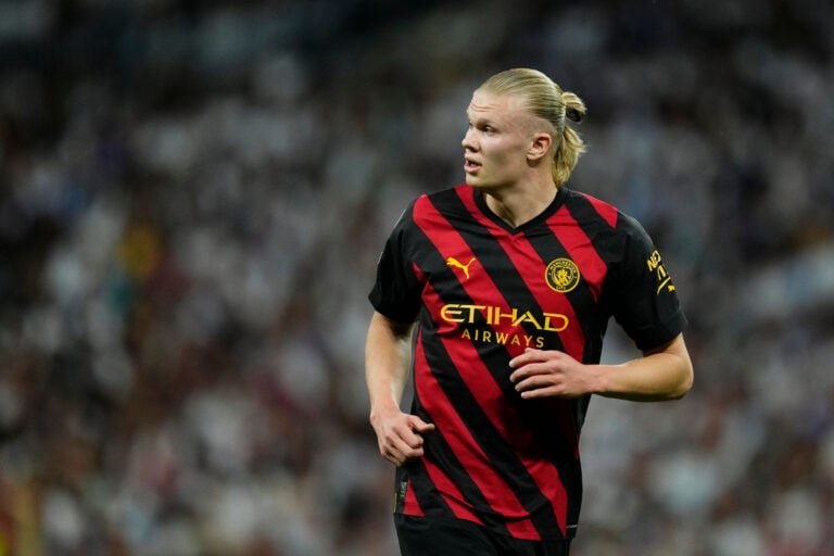Erling Haaland playing for Manchester City in the 2022-23 Champions League. Photo: Jose Breton - Pics Action / Shutterstock.com.