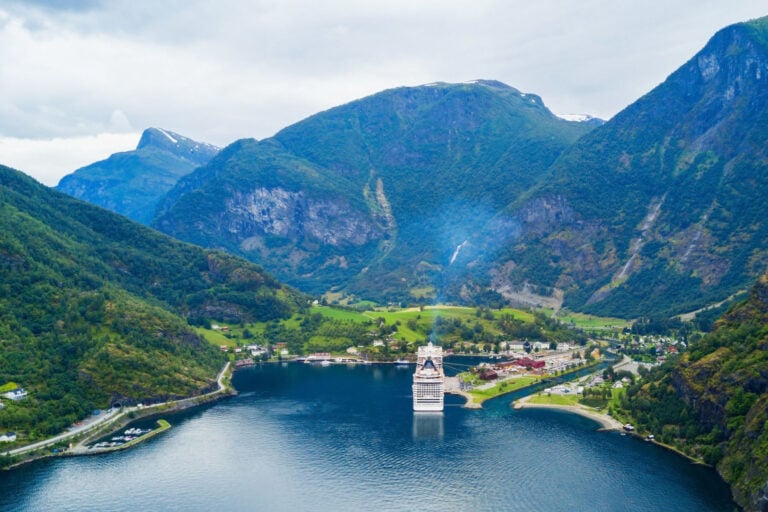 Norway's Flåm with a cruise ship in dock.