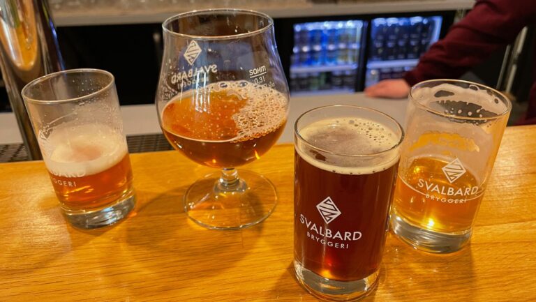 Tasting beers at Svalbard Brewery taproom in Longyearbyen.