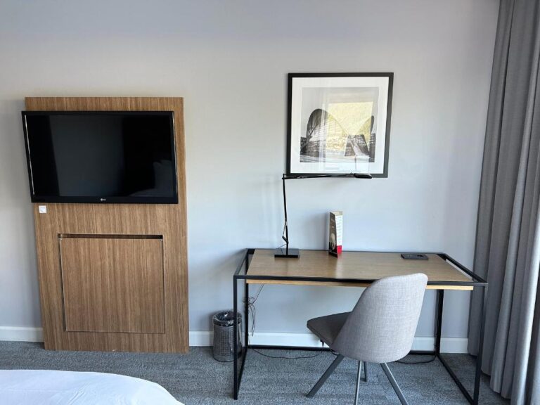 Work desk and TV in the Tromsø hotel room.