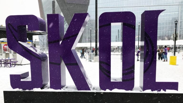 Skol sign outside Minnesota Vikings stadium. Photo: Jeff Bukowski / Shutterstock.com.