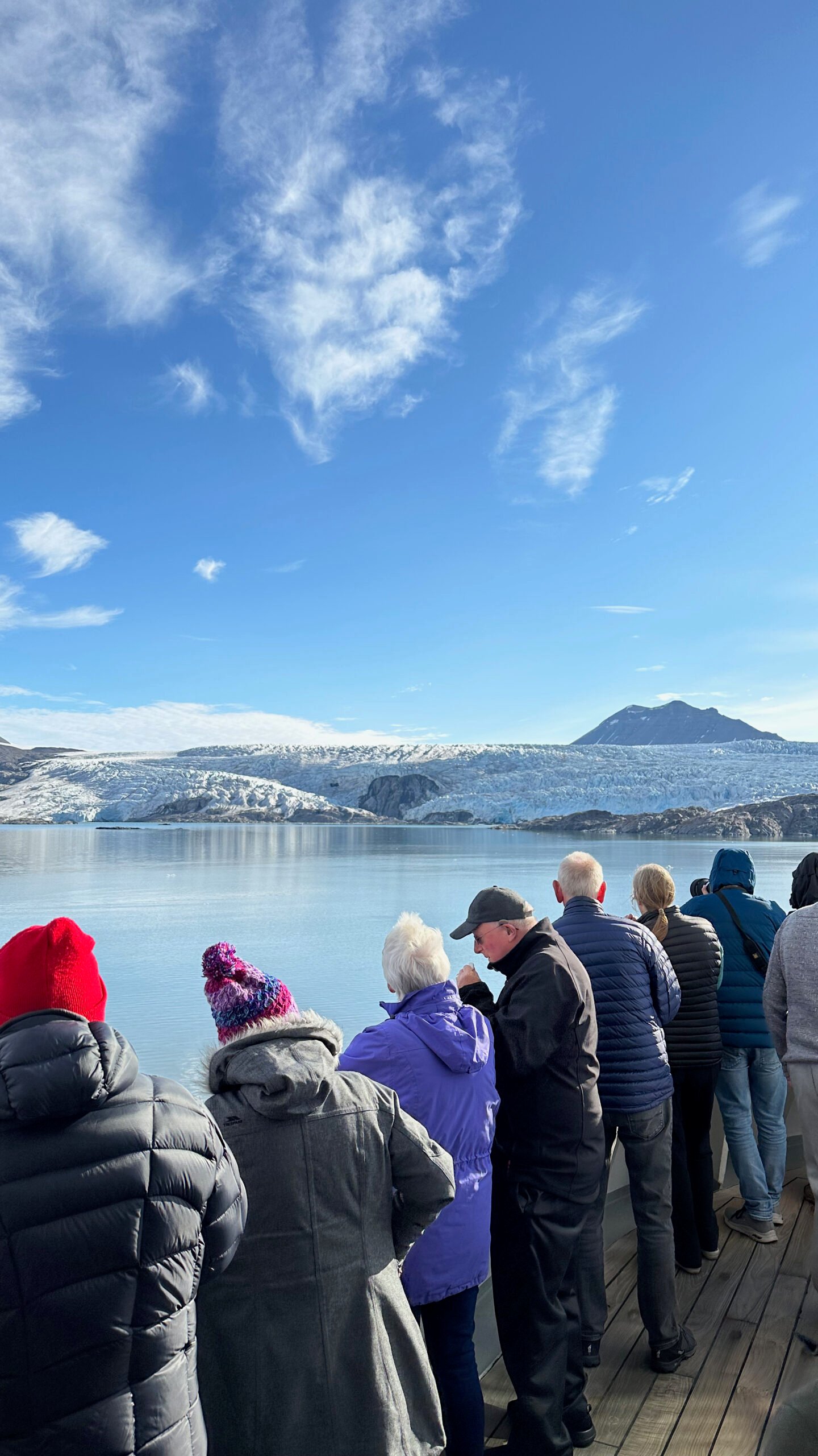 Guests on the Fred Olsen Balmoral looking at Svalbard's Nordenskiöldbreen glacier.