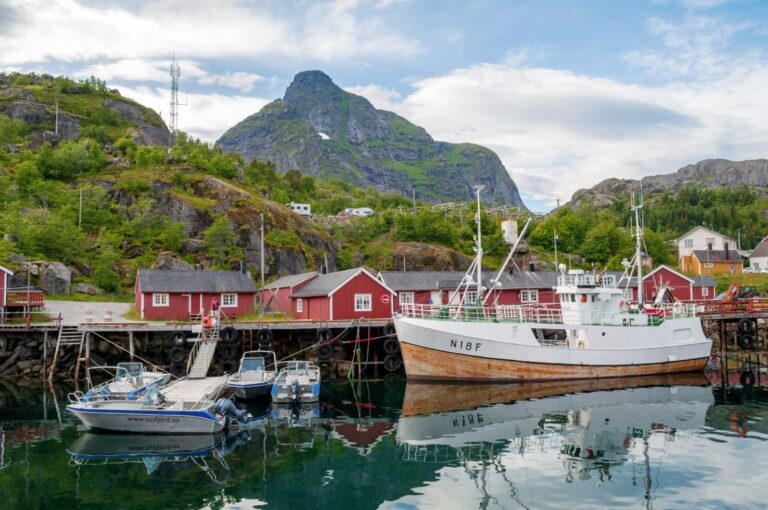 Nusfjord fishing boat and mountains. Photo: Jan Zabrodsky.