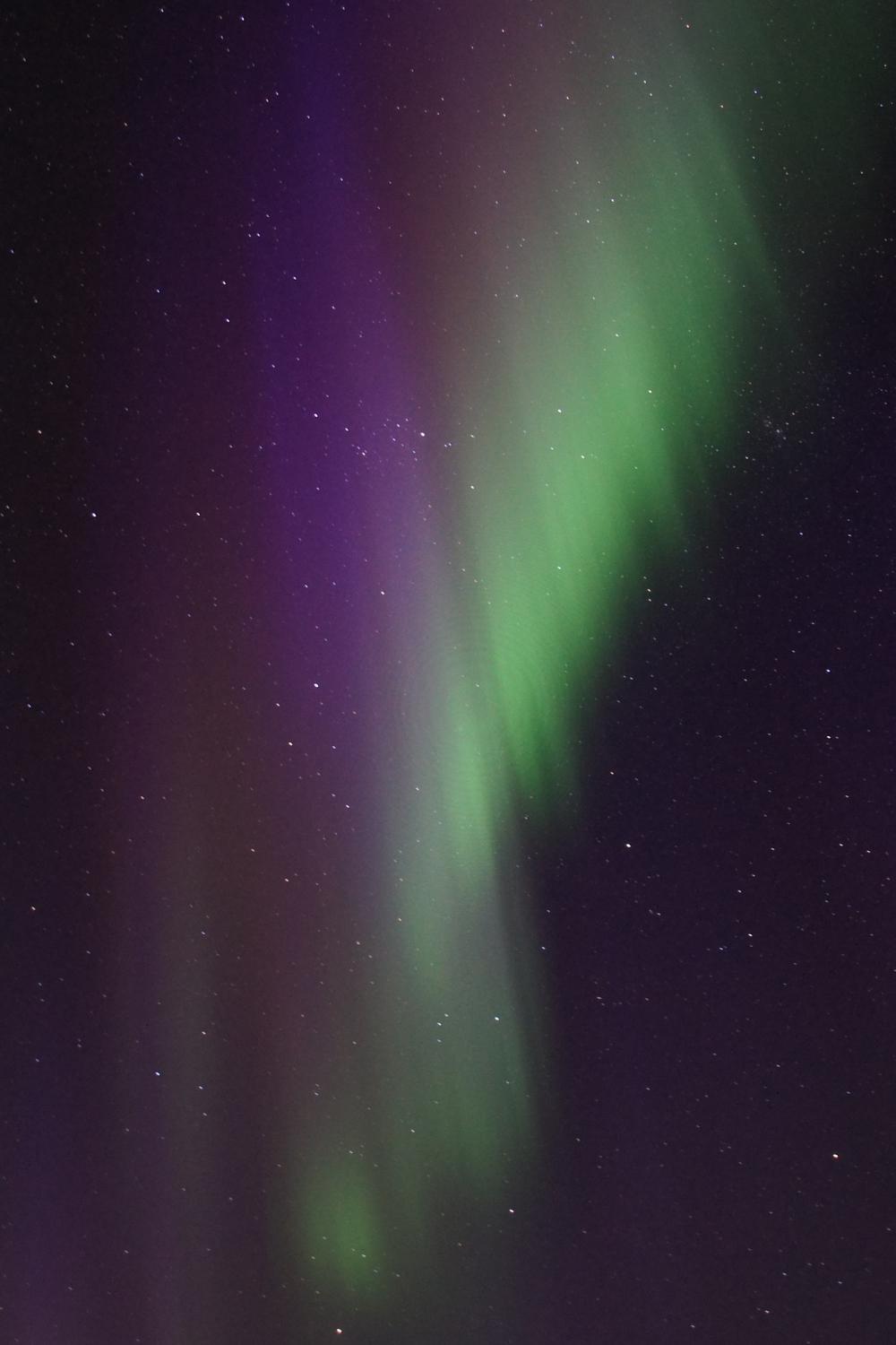 Pale green and purple northern lights.