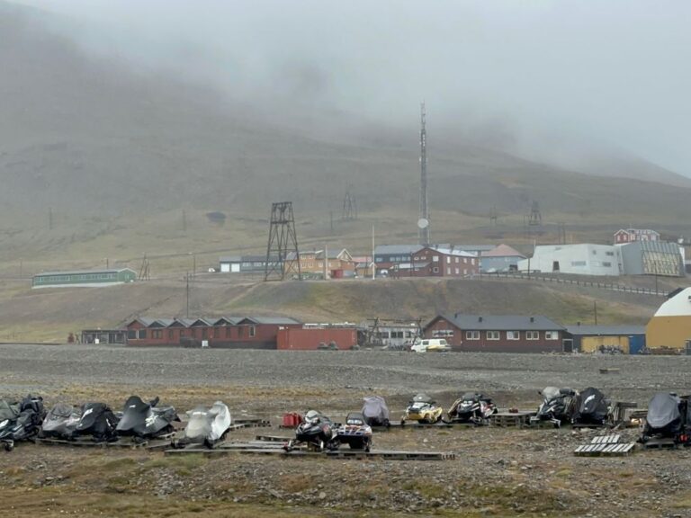 Snowmobiles in Longyearbyen waiting for the winter.