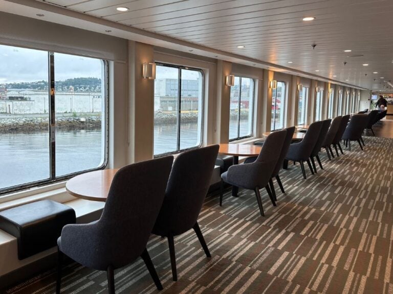 Window seats inside the Polarlys, a Hurtigruten coastal cruise ferry in Norway.