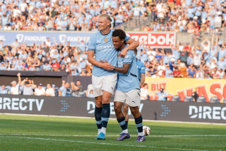 Oscar Bobb playing with Erling Haaland at Manchester City. Photo: lev radin / Shutterstock.com.