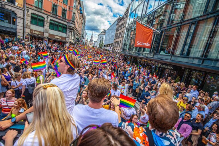 Street party and parade at Oslo Pride. Photo: Fredrik Ahlsen / Shutterstock.com.