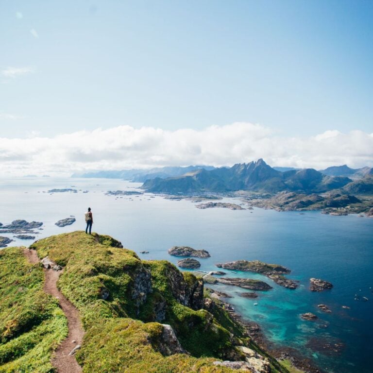 Hiker taking in a spectacular view in Norway.