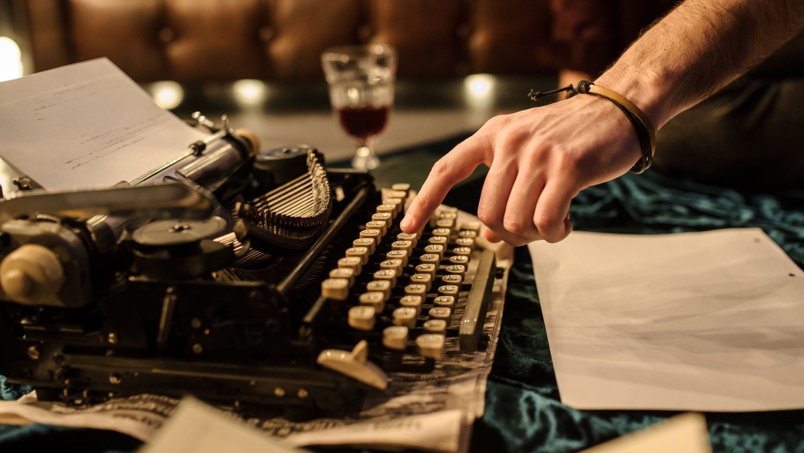 Man on a typewriter.