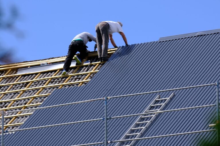 Carpenters working on a roof in Norway.