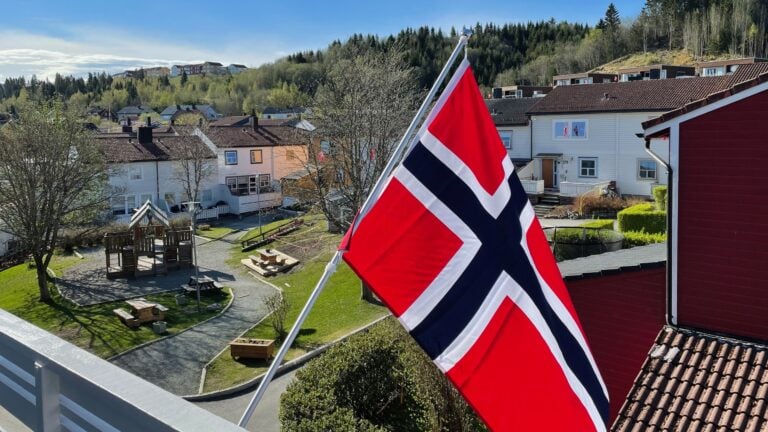 Norwegian flag on balcony. Photo: David Nikel.