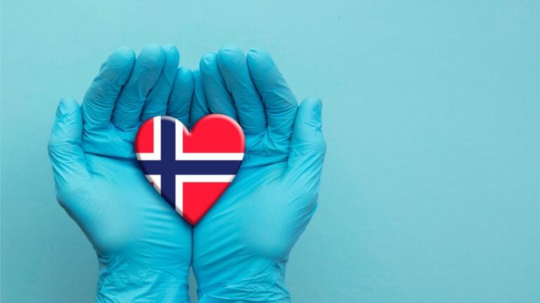 Thanks concept in Norway with hands cupping a heart.