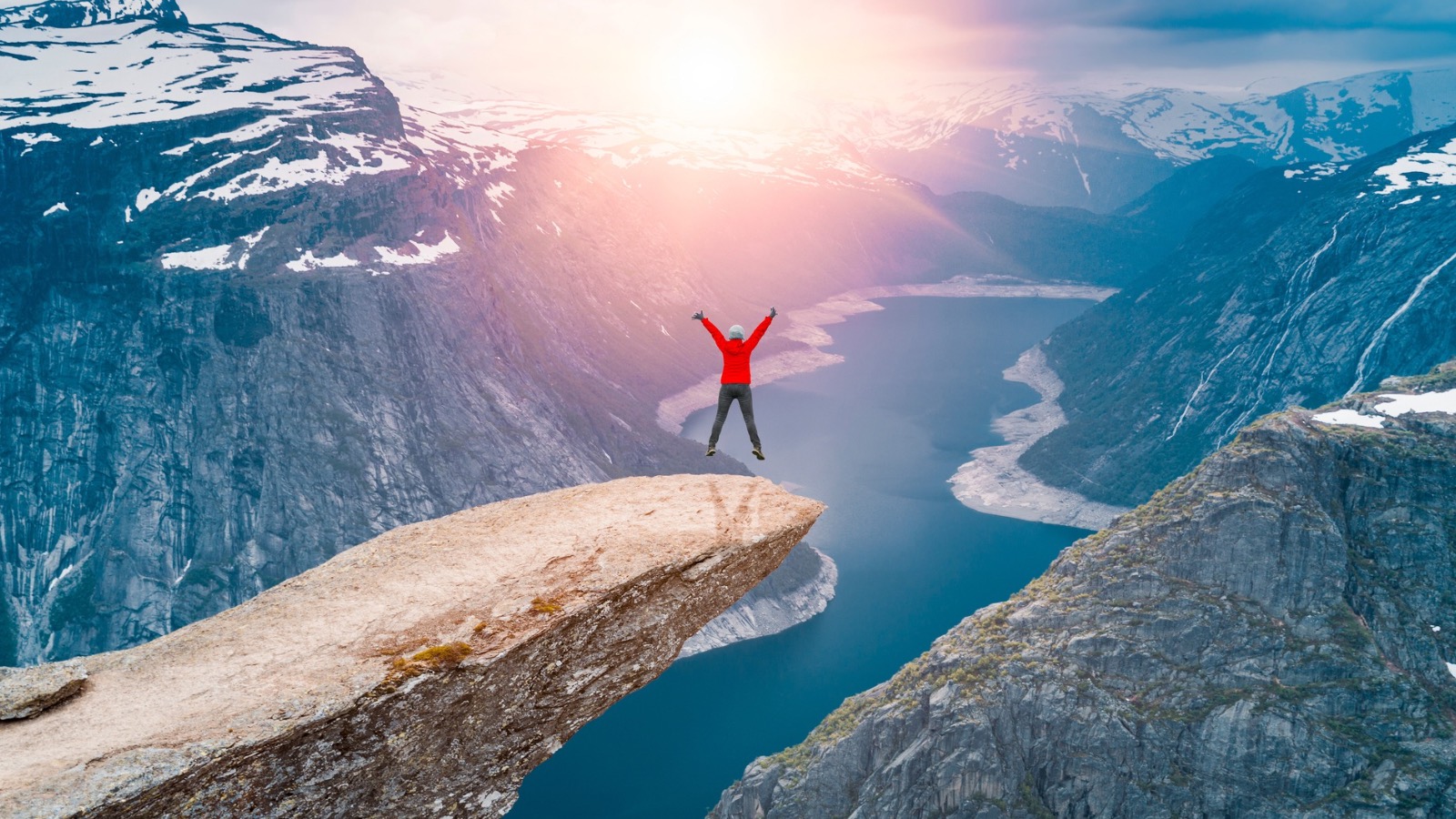 Person enjoying themselves on Trolltunga in Norway.