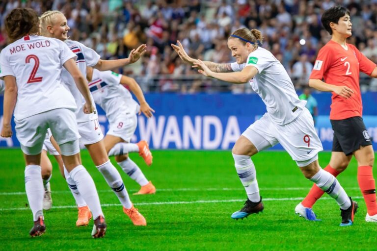 Norway players celebrate a goal in the 20199 FIFA Women’s World Cup. Photo: Mikolaj Barbanell / Shutterstock.com.