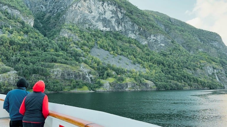 Passengers on Fred Olsen Borealis enjoy a fjord view. Photo: David Nikel.