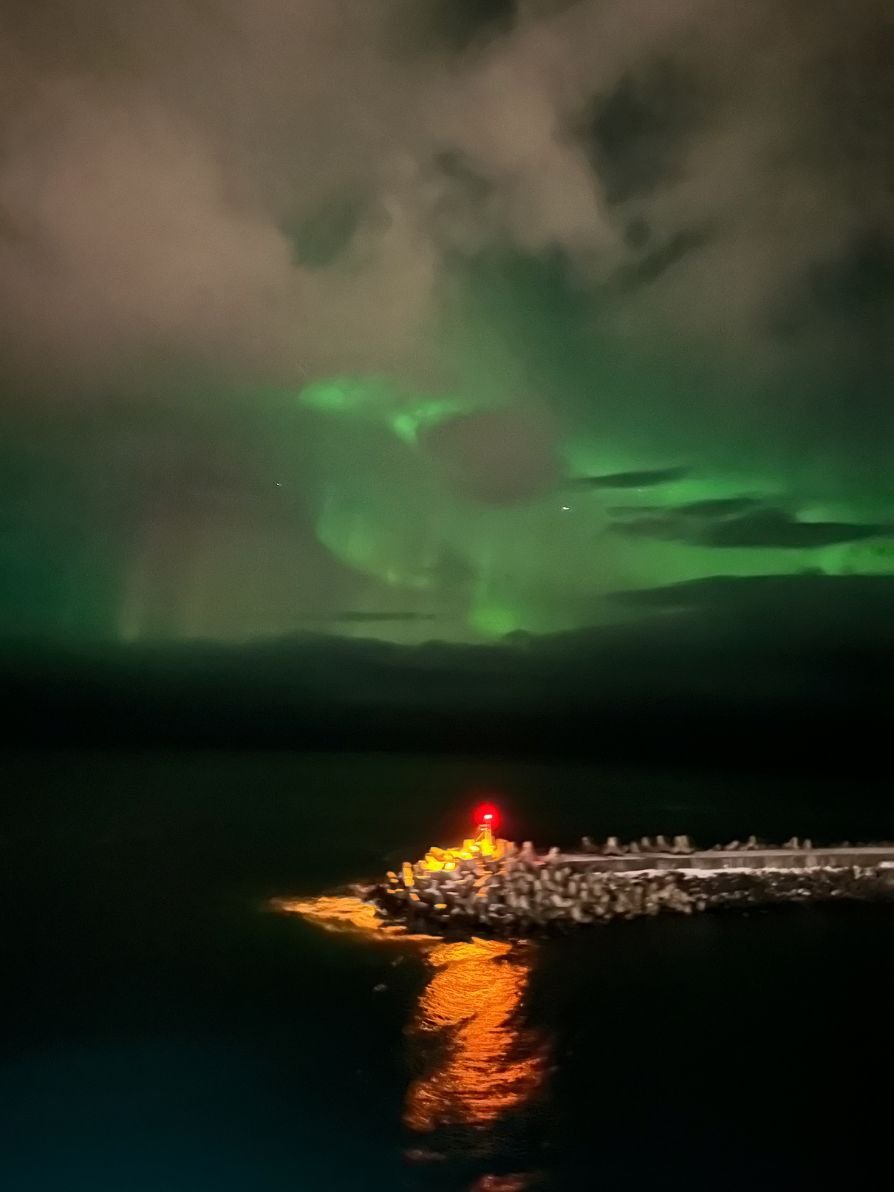 Aurora borealis display behind the clouds at Berlevåg. Photo: David Nikel.