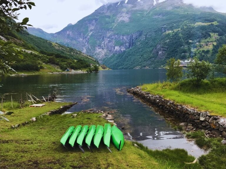 Kayaks on the shore of the Geirangerfjord. Photo: David Nikel.