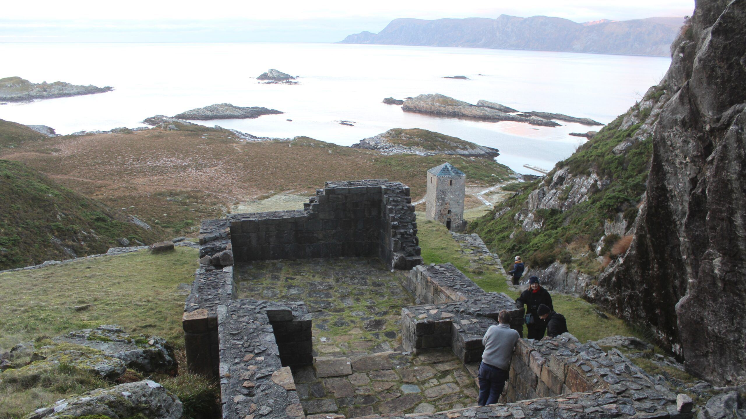 The ruins of St. Sunniva's Church with Stadlandet in the background. Photo: Regin Meyer, NIKU.
