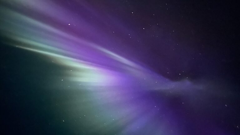 An explosion of green and purple aurora borealis in Norway. Photo: David Nikel.
