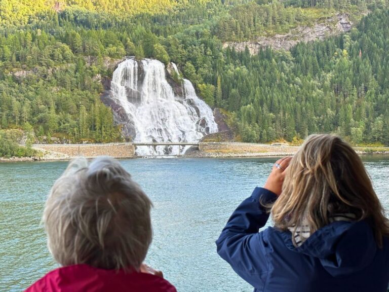 Cruise ship guests admiring Furebergsfossen waterfall. Photo: David Nikel.